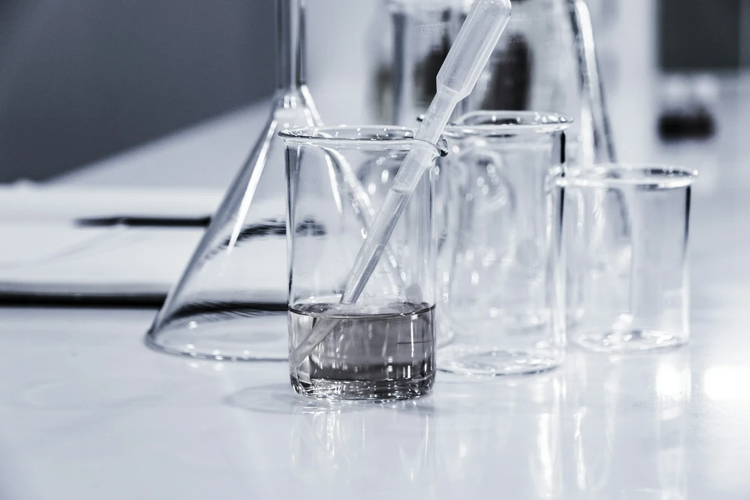 Clear beakers and equipment on a lab table